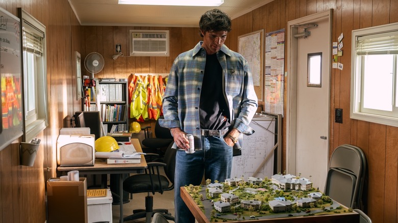 Nate looking at a model of a construction project on Euphoria Season 3