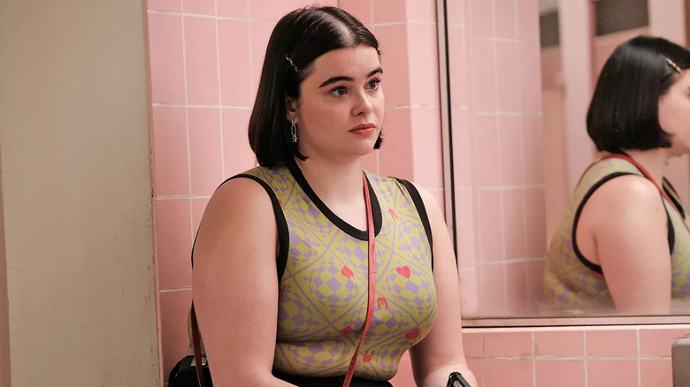 Kat looks concerned in front of a bathroom mirror in "Euphoria" (2019-2026)