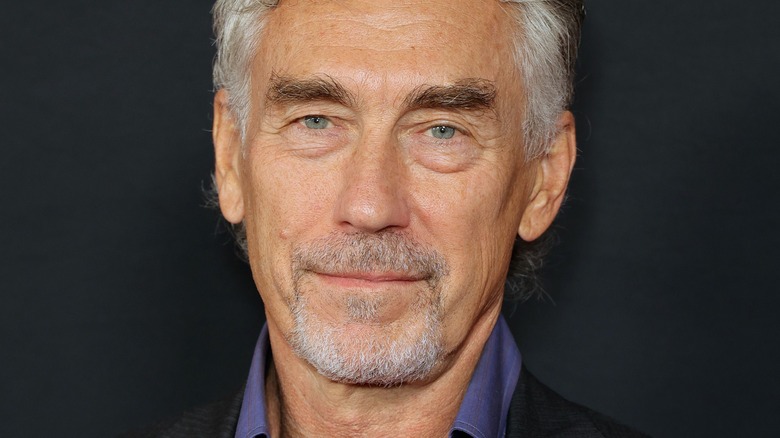 Tony Gilroy smirking
