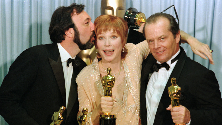 James L. Brooks, Shirley MacLaine, and Jack Nicholson pose with Oscars