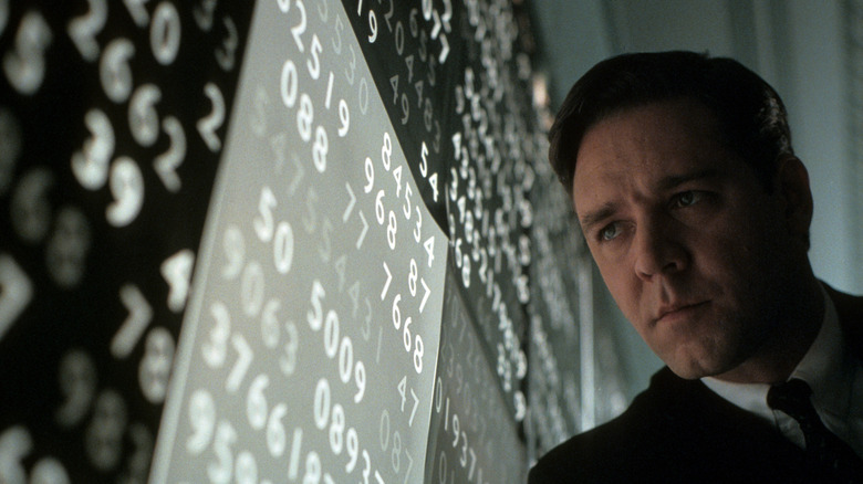 Kevin Nash examining numbers in "A Beautiful Mind" (2000)
