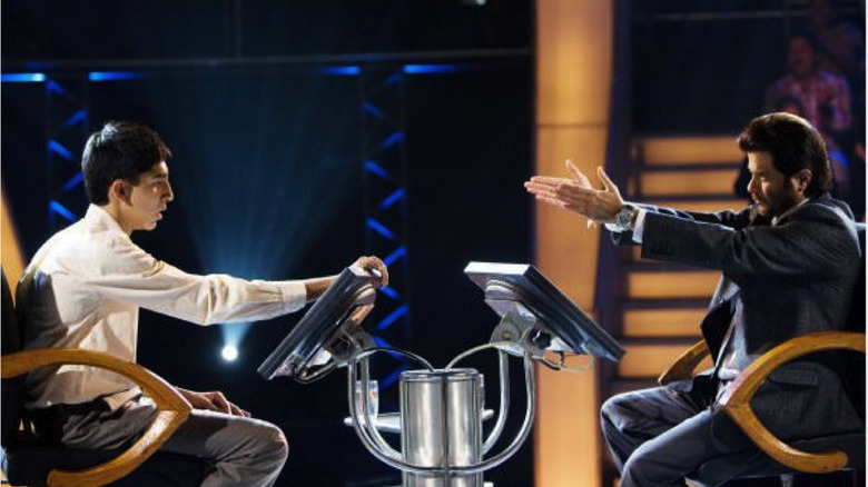 Jamal Malik on a game show in "Slumdog Millionaire" (2008)