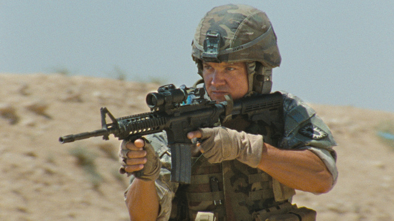 Sergeant First Class William James aiming his weapon in "The Hurt Locker" (2009)