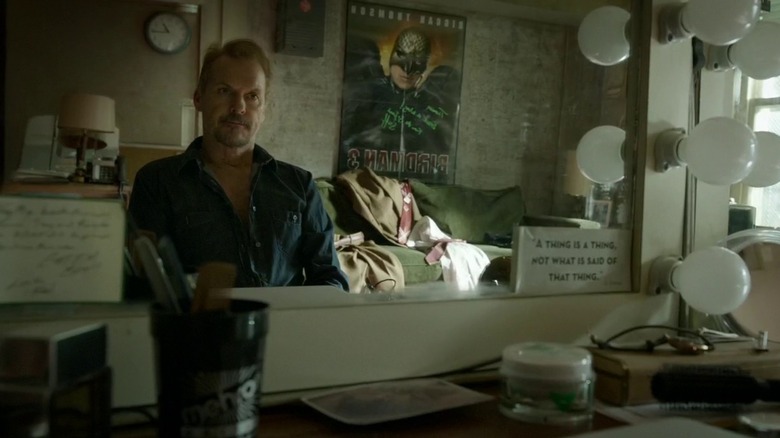Riggans looking at himself in the mirror in Birdman (2014)