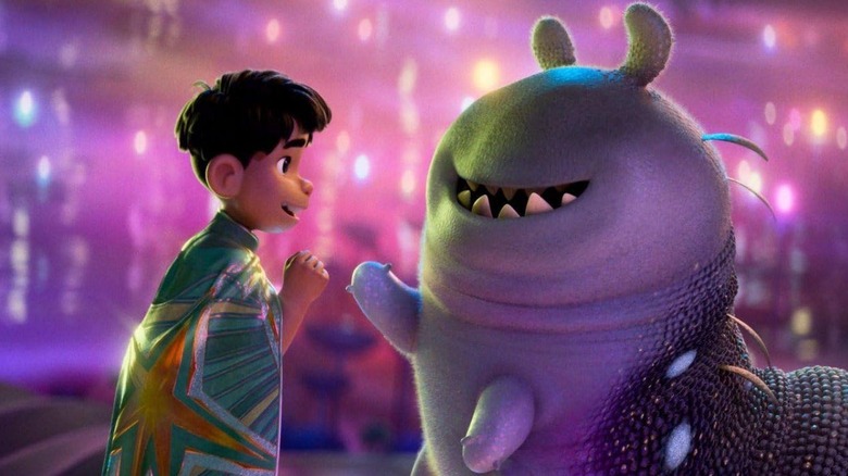 Elio and Glordon sharing a handshake in "Elio" (2025)