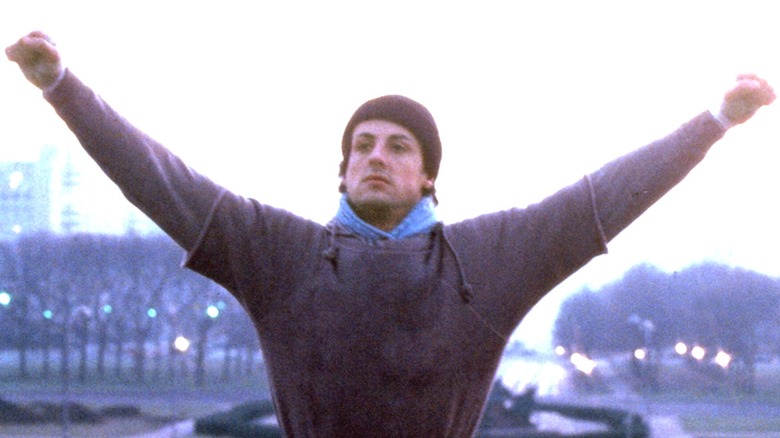 Rocky Balboa holding up his arms in "Rocky"