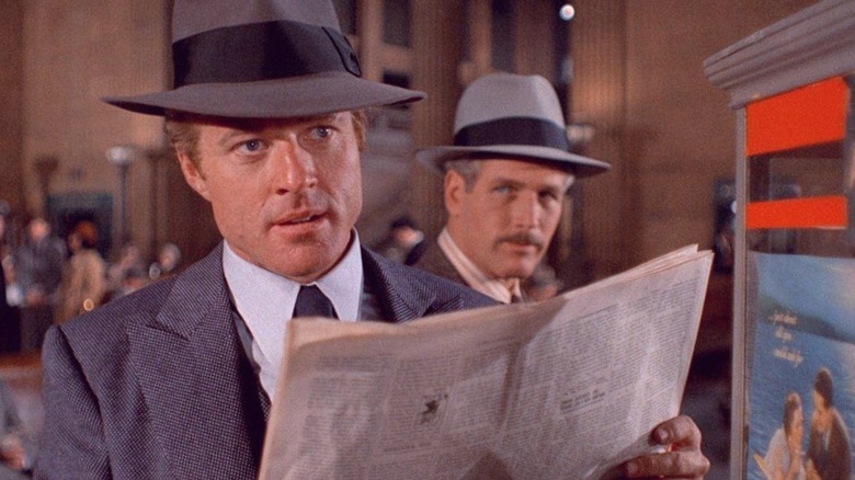 Henry and Johnny standing together in "The Sting"