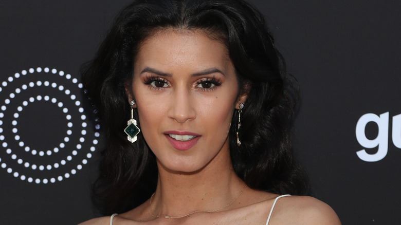 Jaslene Gonzalez wearing dangling earrings