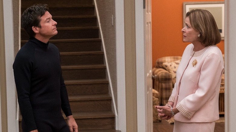 Michael confronts Lucille at the beach house