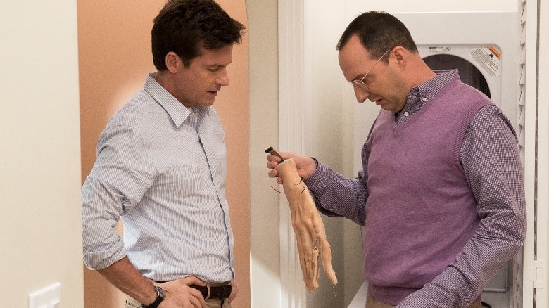 Buster gives Michael a hand