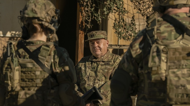 Colonel Williams looking at his troops in Stuart Fails to Save the Universe