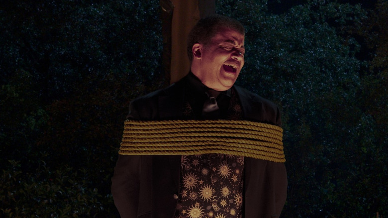 Neil DeGrasse Tyson being burned at the stake in Stuart Fails to Save the Universe
