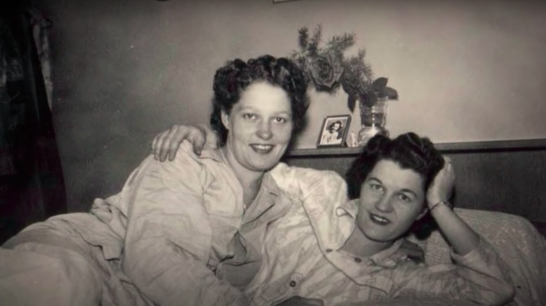 Old photo of Terry Donahue and Pat Henschel lounging