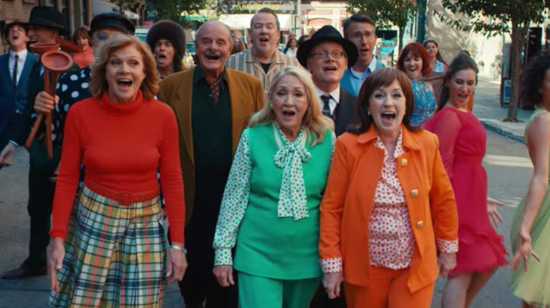 Musical theater actors singing in the street