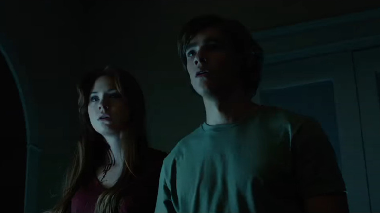 Karen Gillan and Brenton Thwaites looking concerned