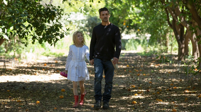 Shree Crooks and Frank Grillo walking