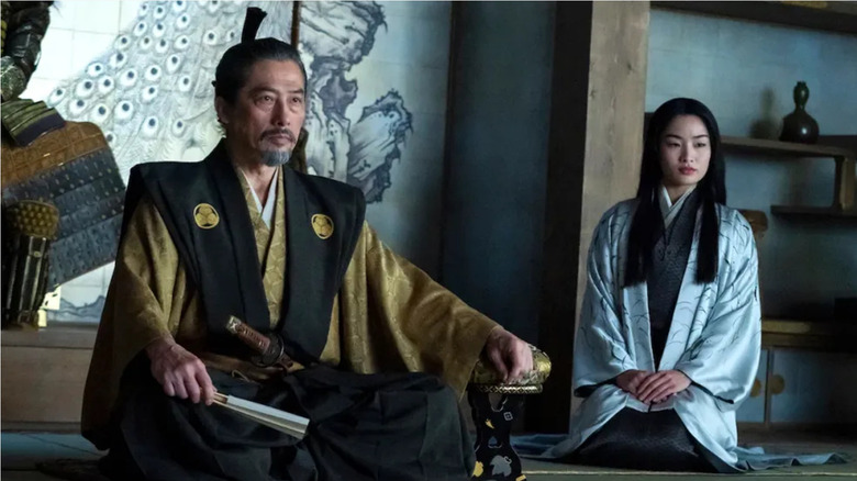 Yoshii Toranaga and Toda Mariko sitting together in 