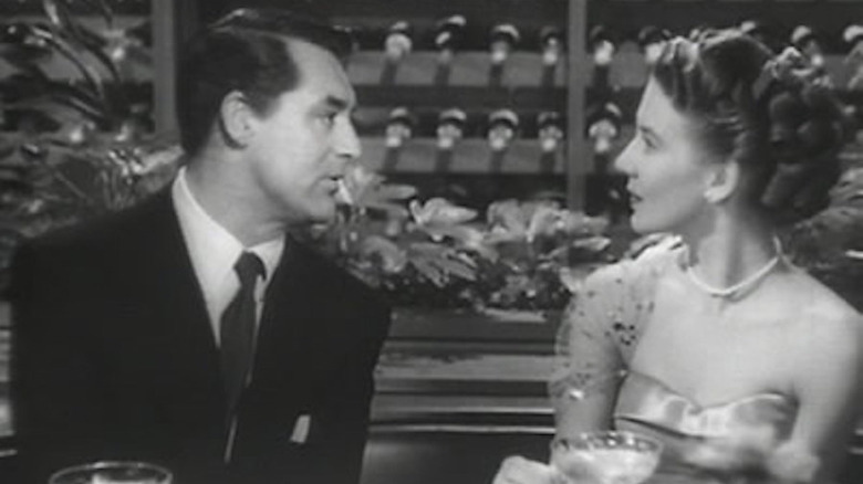 Grant sits with Betsy Drake