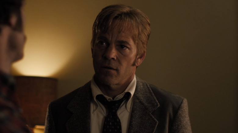 Detective Roland West talks with a suspect 