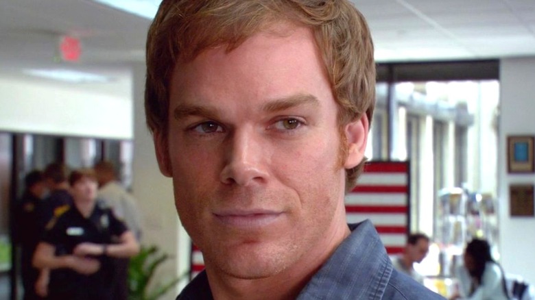 Dexter stands in police station