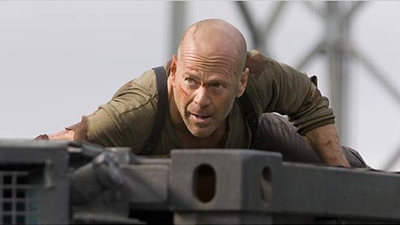 John McClane Driving Bloody