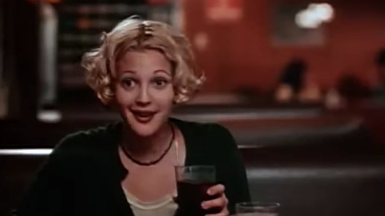 Holly talking to Robin while eating