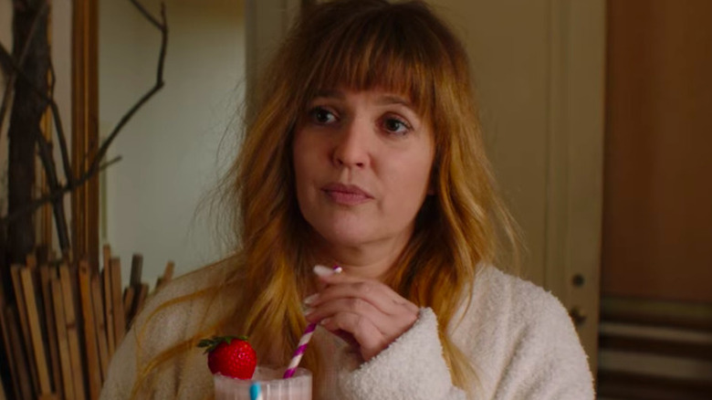 Paula drinking a milkshake