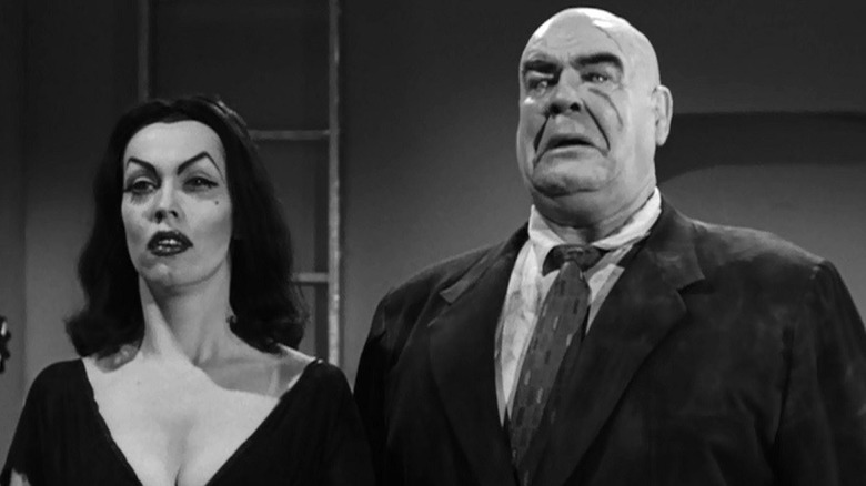 Vampira looks left