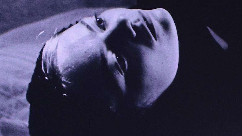 Emma Stone's character lying down in "Bleat"