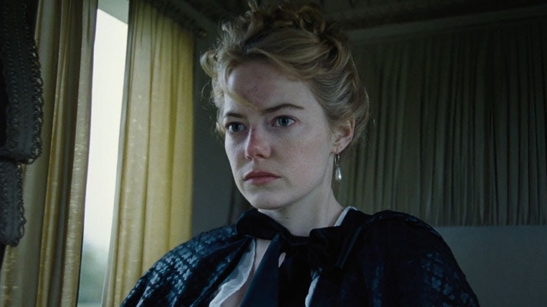 Abigail Hill riding in a carriage in The Favourite
