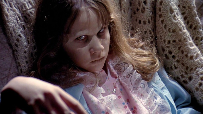 Possessed Regan stares menacingly in The Exorcist