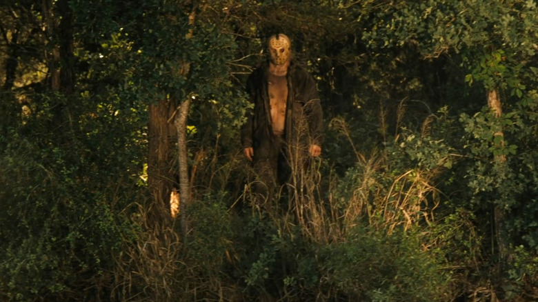 Jason Voorhees stands on the edge of Crystal Lake in Friday the 13th (2009)