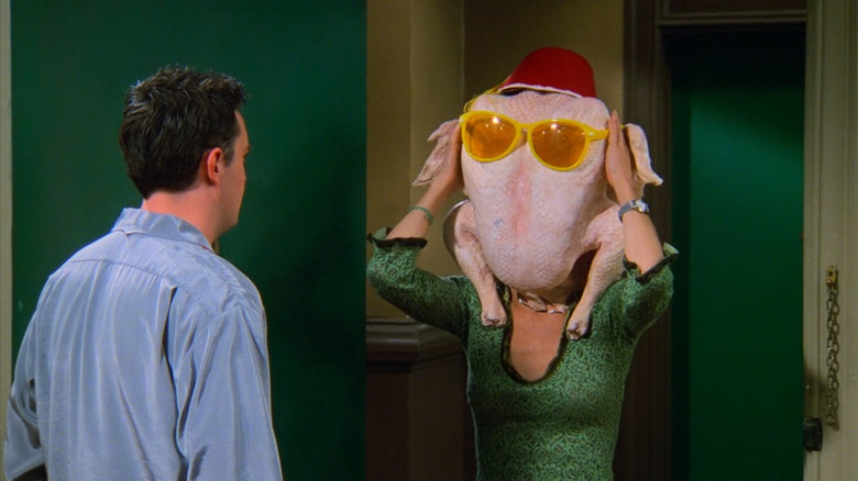 Monica wears turkey on head