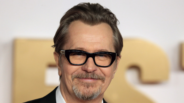 Gary Oldman smiles