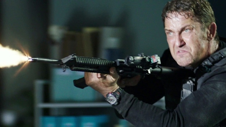 Mike Banning shooting gun