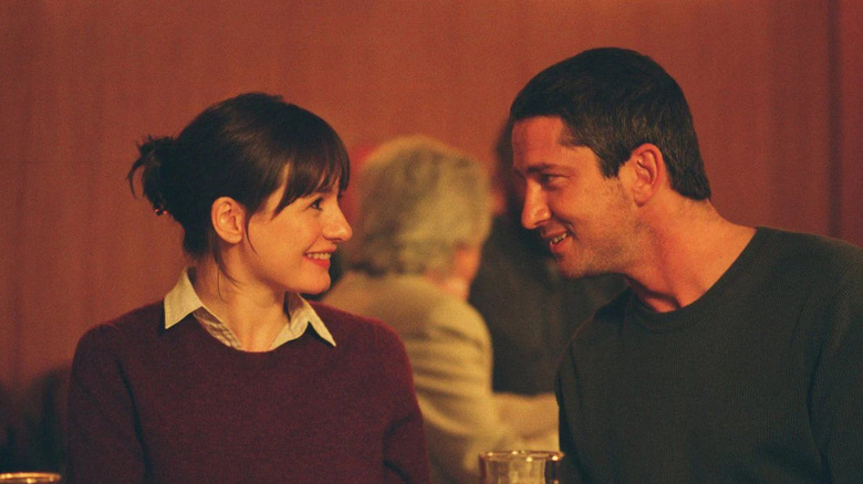 Emily Mortimer and Gerard Butler smiling