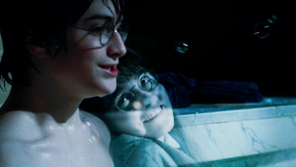 Moaning Myrtle and Daniel Radcliffe as Harry Potter in Harry Potter and the Goblet of Fire