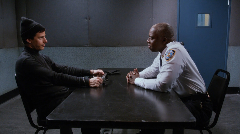 Jake Peralta holds pigeons