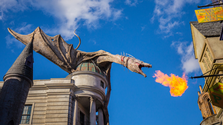 Dragon breathing fire on top of Gringotts bank