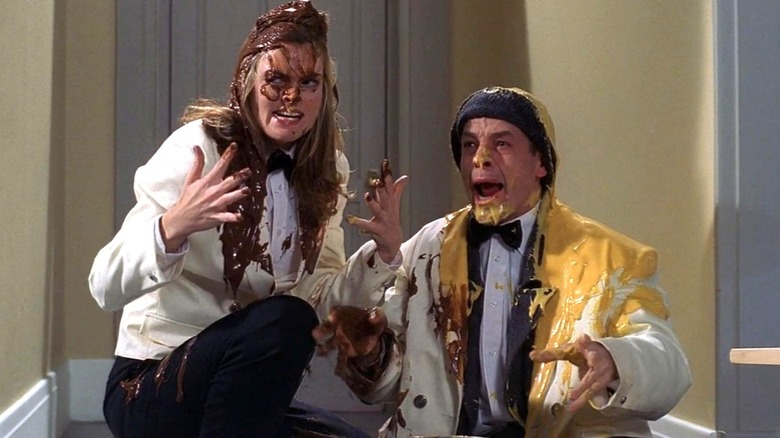 Vera and Marv scream while covered in chocolate and cheese in Home Alone 4 (2002)