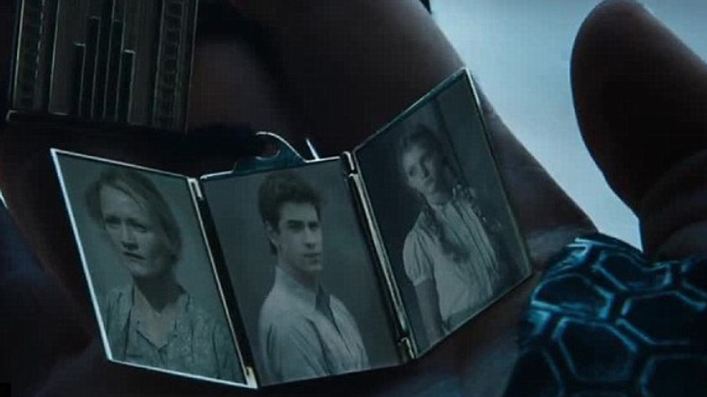 Katniss with her token