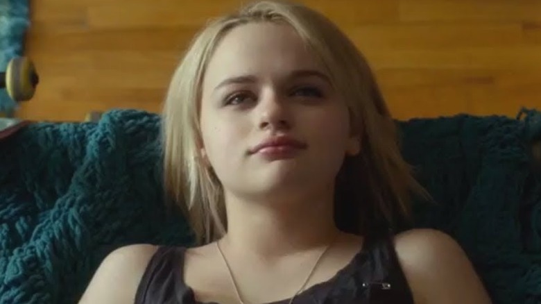 Joey King looks up from couch