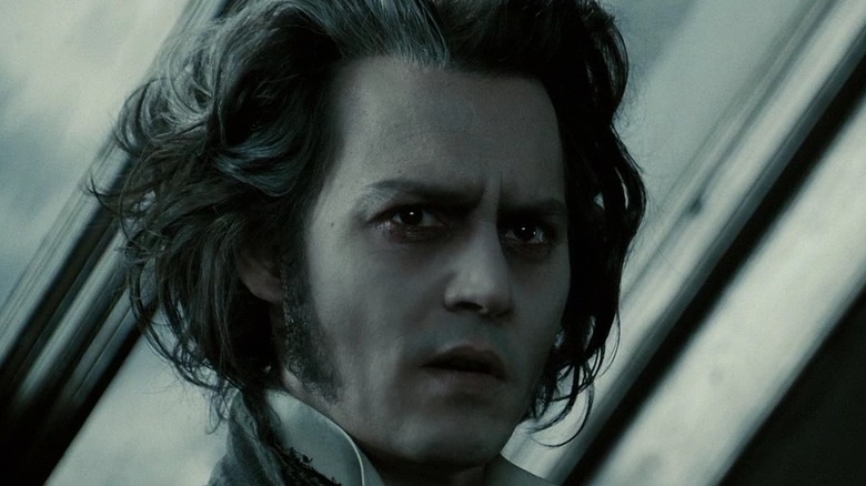 Sweeney Todd in front of window