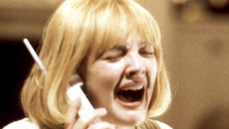 Drew Barrymore screaming with phone