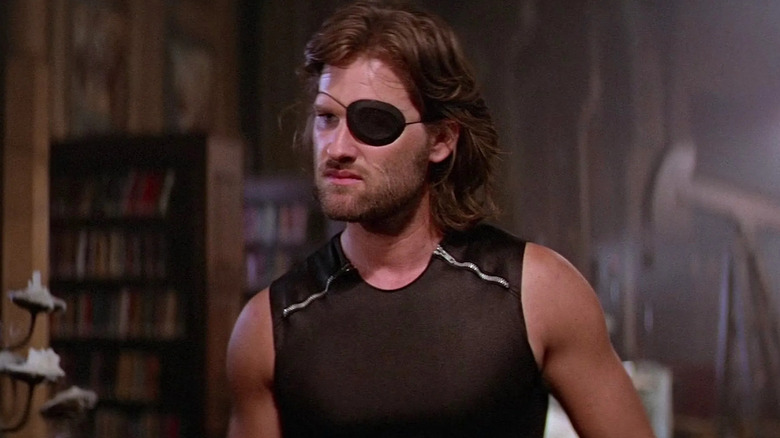 Snake looks up and sneers