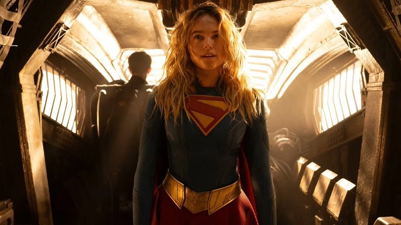 Supergirl boarding a cosmic bus in "Supergirl" (2026)