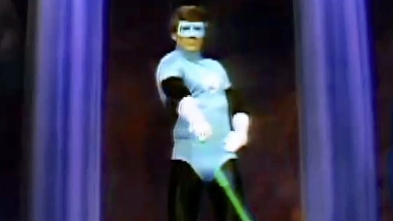 Green Lantern fires an energy beam in "Legends of the Superheroes" (1979)