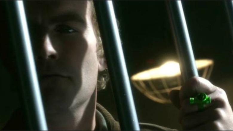 Green Lantern looks through prison bars in "Smallville" (2001-2011)