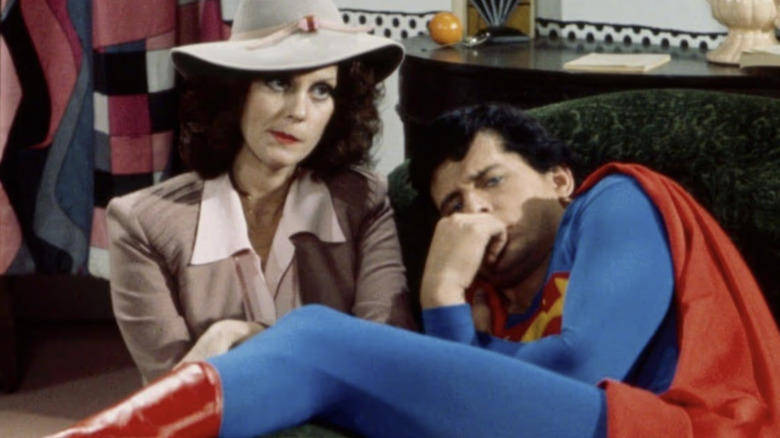Superman curls up in a chair next to Lois Lane in "It's a Bird ... It's a Plane ... It's Superman" (1975)