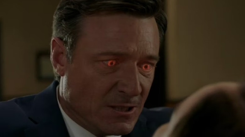 Lucifer choking Kelly as Rooney